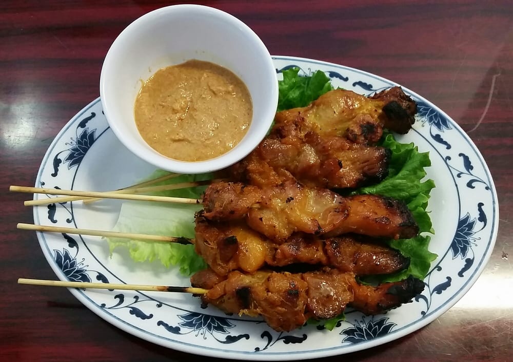 Chicken satay skewers with peanut sauce