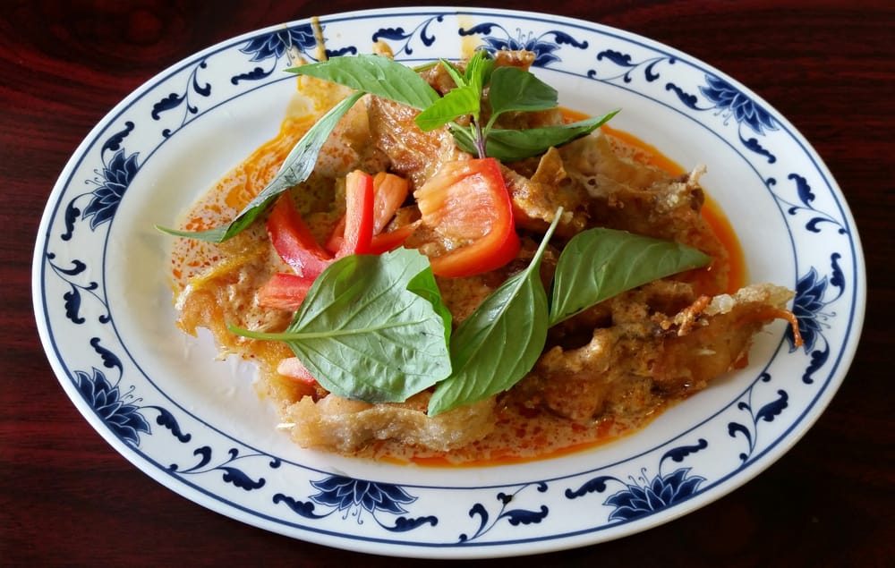 Red curry with crispy pork, tomato and Thai basil